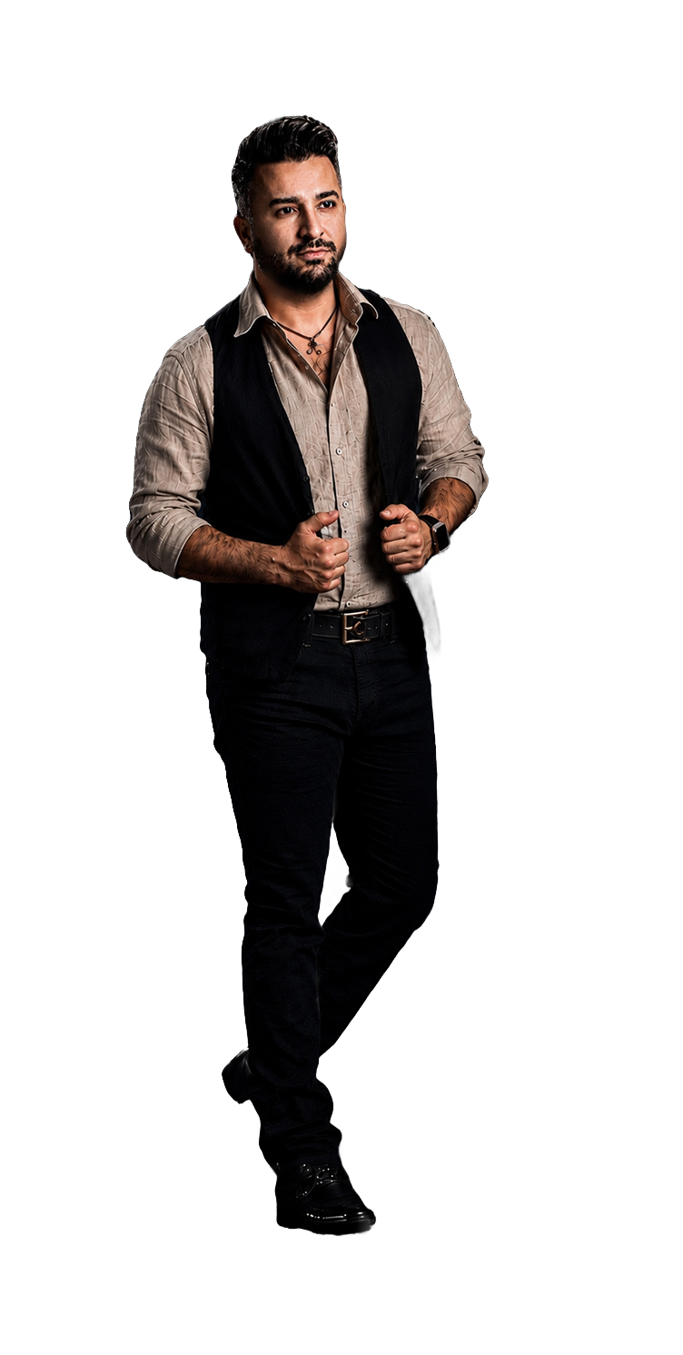 Aria Moeini walking onto a black-and-gold opera stage in a beige shirt and black vest